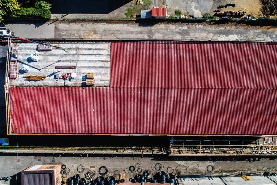 Ristrutturazione facciata e copertura Auteco - Aeffe lattoneria coperture